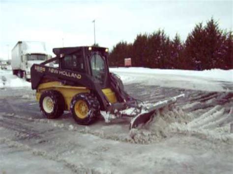 new holland skid steer snow plow|new holland tc18 attachments.